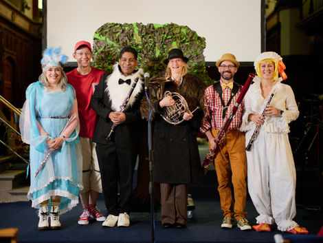 Musicians in costumes with instruments