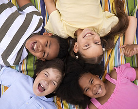 medium-shot-kids-laying-together-scaled-1 (1).jpeg