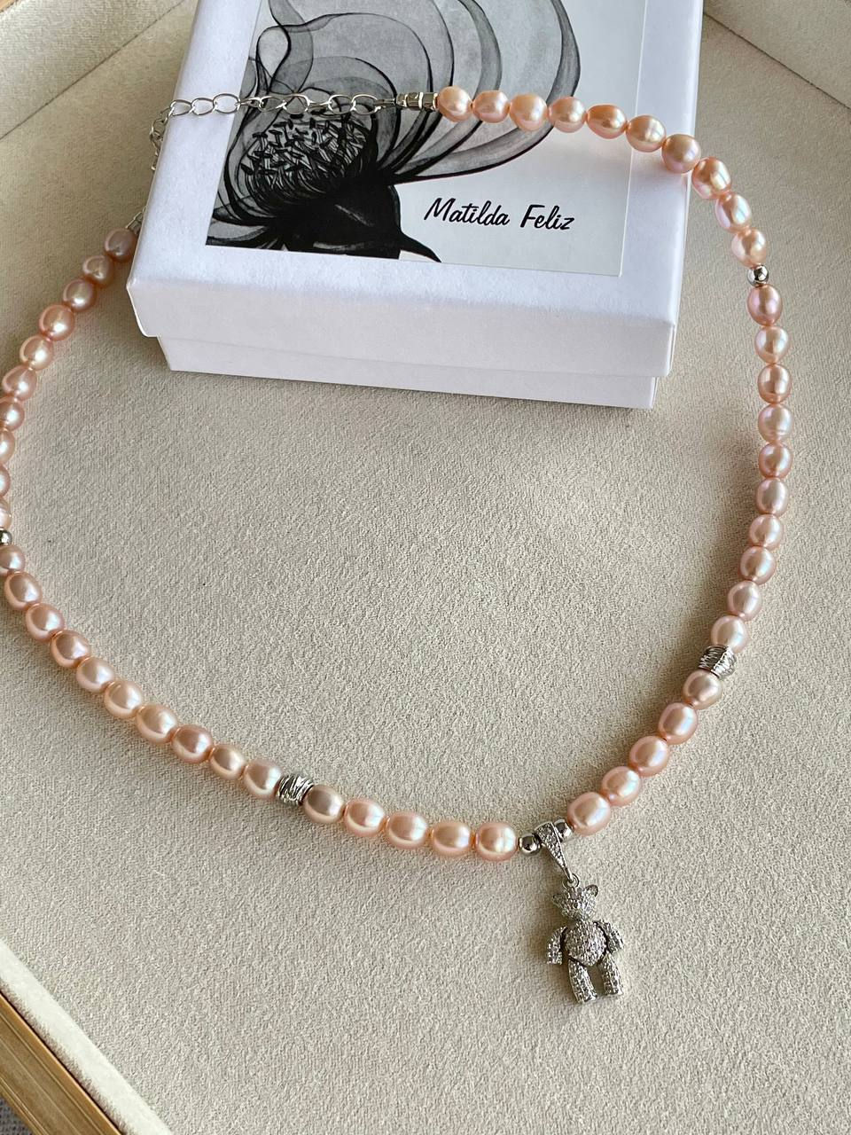 Thumbnail: Necklace with peach pearls and Bear