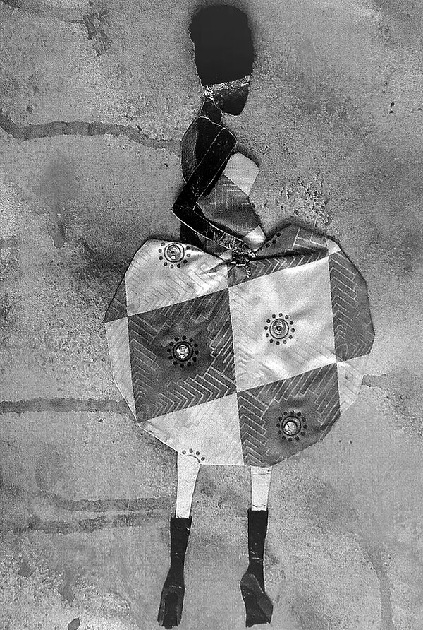 Mixed media fabric collage of Black woman