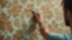 Old wallpaper layers being removed