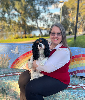 Kellie Coff holding Lexi the Cavalier.jpeg