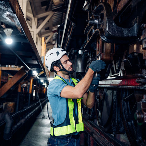 Train/Railway worker working on a train