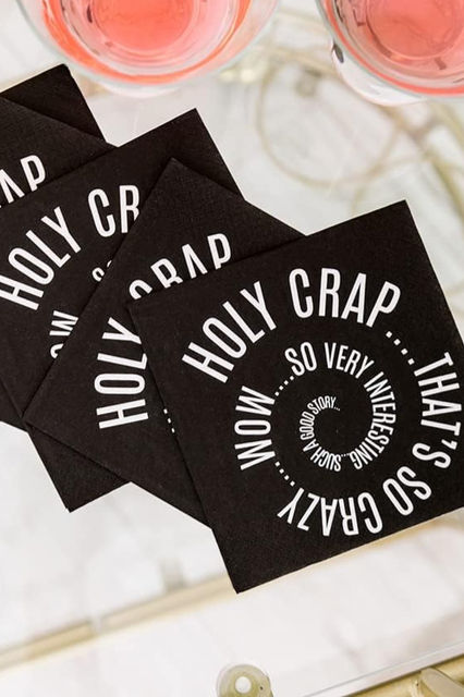 Black cocktail napkins with spiraling "Holy Crap That's So Crazy, Wow, So Very Interesting..."