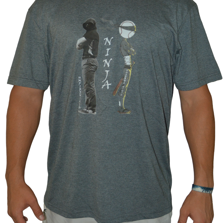 Front of a grey t-shirt showing two side-by-side ninja figures: the Umpire Ninja, and the Baseball Ninja, with "Ninja" text