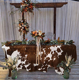 Brown/White Cowhide Tablecloth linens rental for weddings, showers, birthdays and corporate events