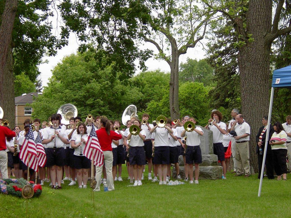 Worthington High School band students perform at the memorial day celebration.