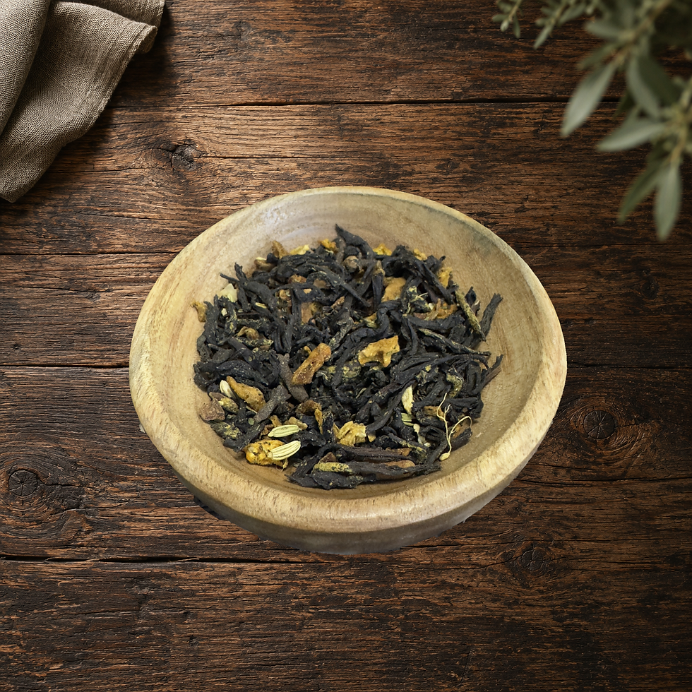 Real Pumpkin Pie Chai loose tea blend in the original wooden bowl on a warm wood table