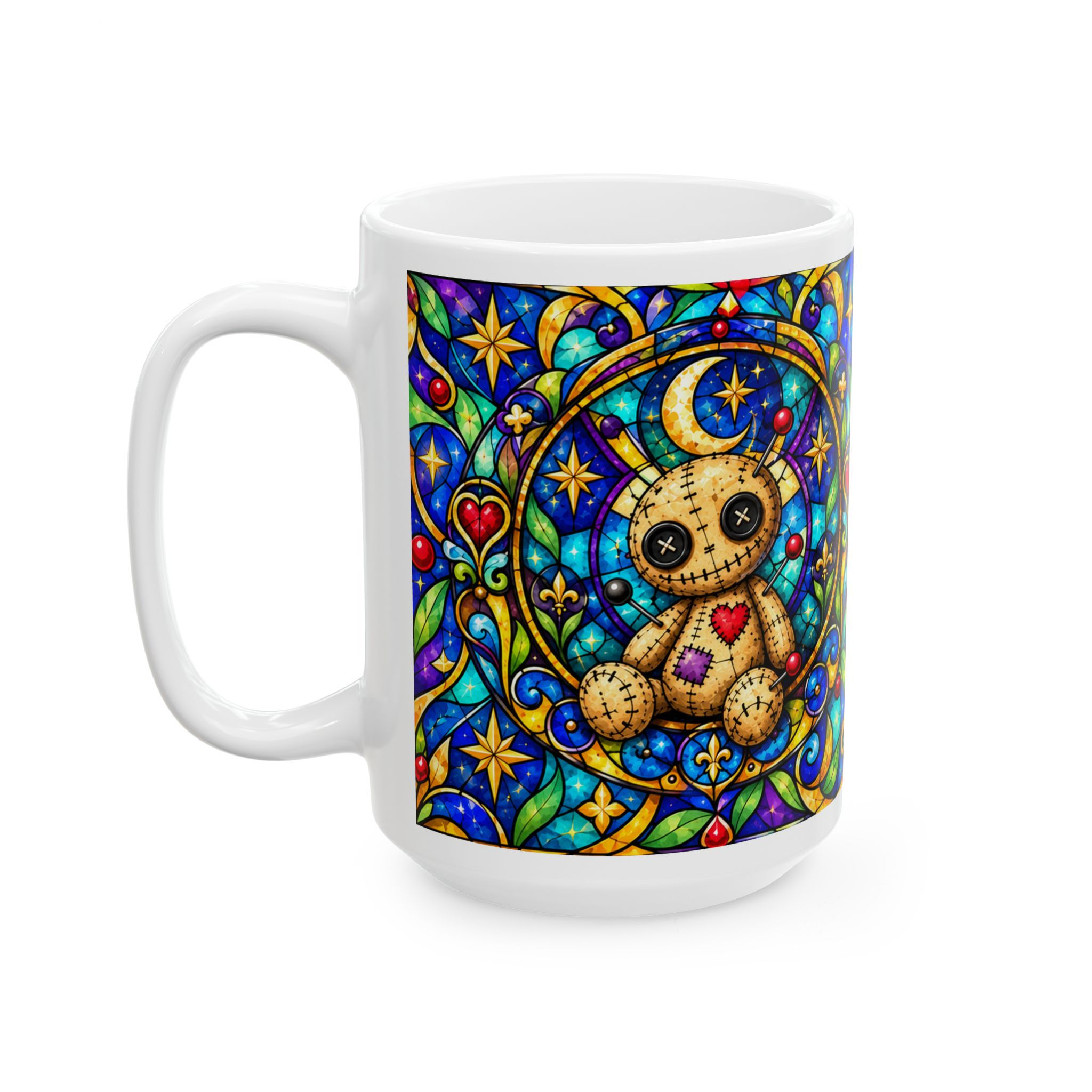 White mug with a stitched doll, crescent moon and colorful stained-glass floral design; front view, handle left