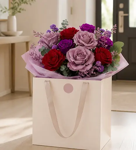 Preserved rose arrangement prepared in a florist carrier for Toronto and GTA delivery