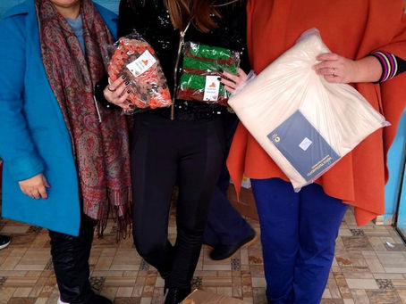 Doação de toucas e ponchos