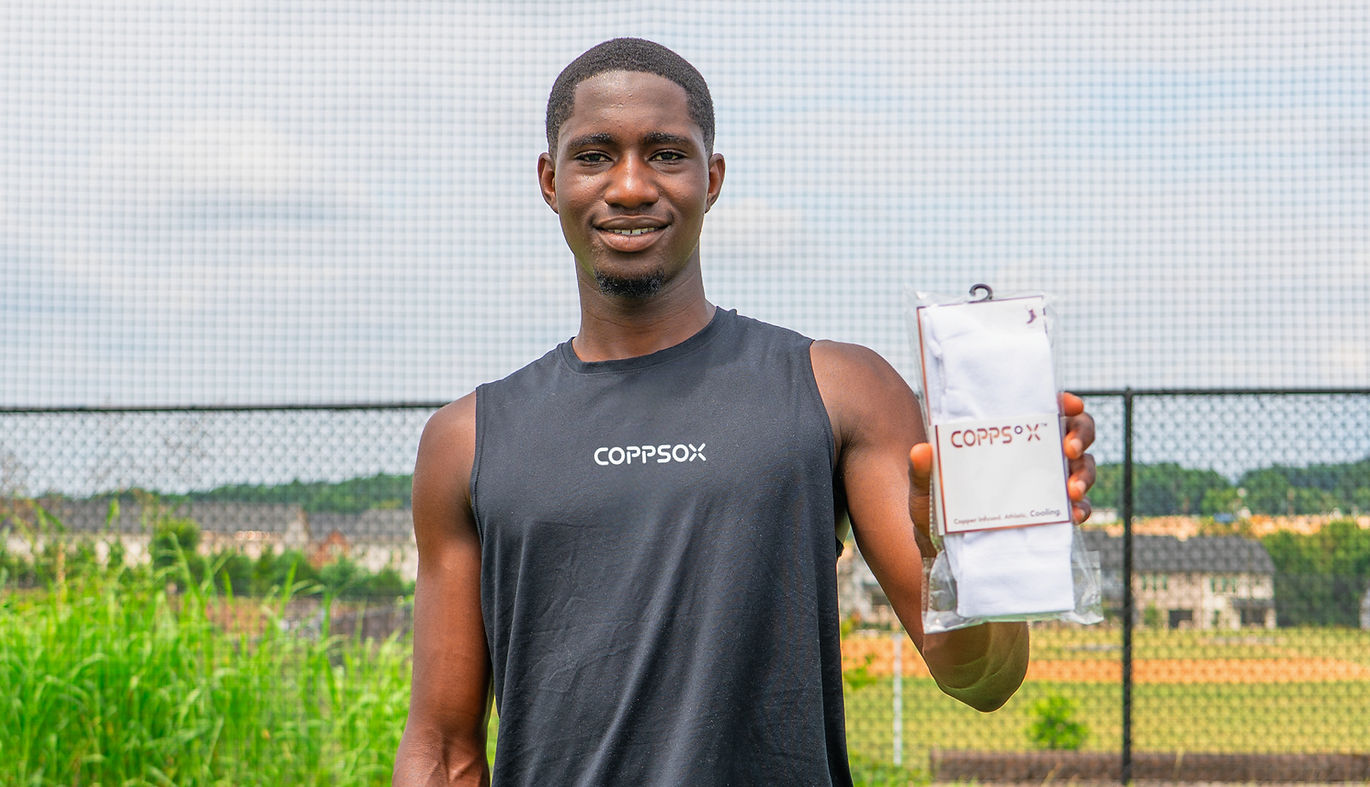 Ekow Yankah holding up Coppsox