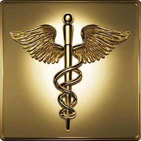 A gold caduceus