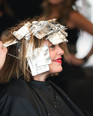 A smiling guest with highlight foils