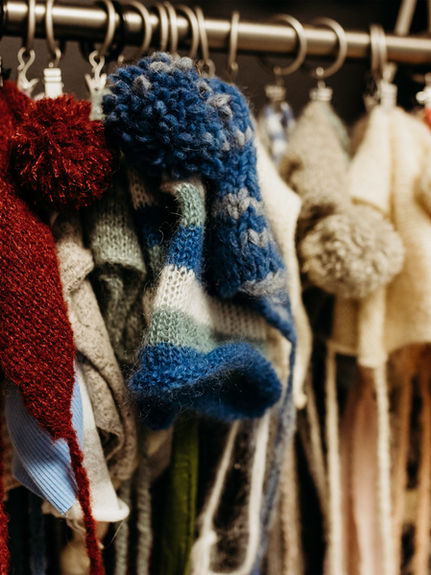 Family photography setup with comfortable seating in Jennifer Ubinas Photography Studio