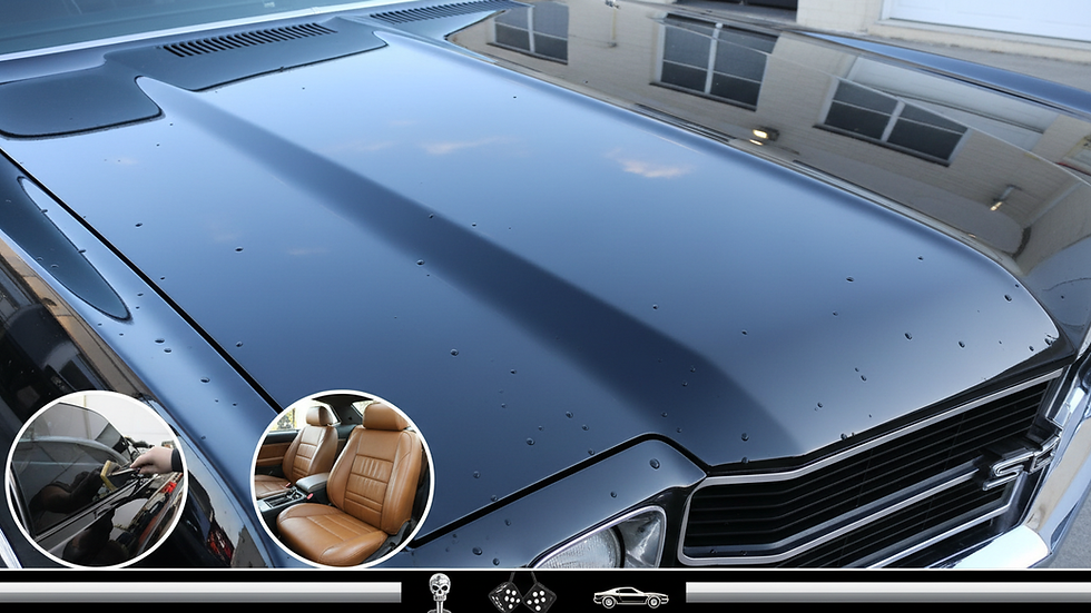 Close-up view of a car’s glossy hood after a premium wax and polish treatment