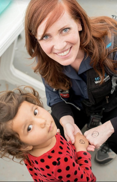 Sarah Franklin with a young Syrian refugee, April 2017 -- Photo by Michelle Ellsworth