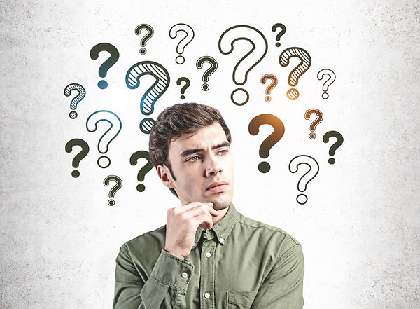 A man wearing a green casual button up shirt, hand on his chin, looking to the side, pondering with question marks above his head. This represents the need for accelerated resolution therapy in katy, tx 77494. This also represents the need for anger management counseling katy, tx 77494.