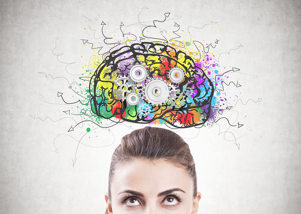 Teen girl looking up at a drawing of her brain. Represents neurofeedback for anxiety katy texas. Also represents neurofeedback for ADHD houston texas.
