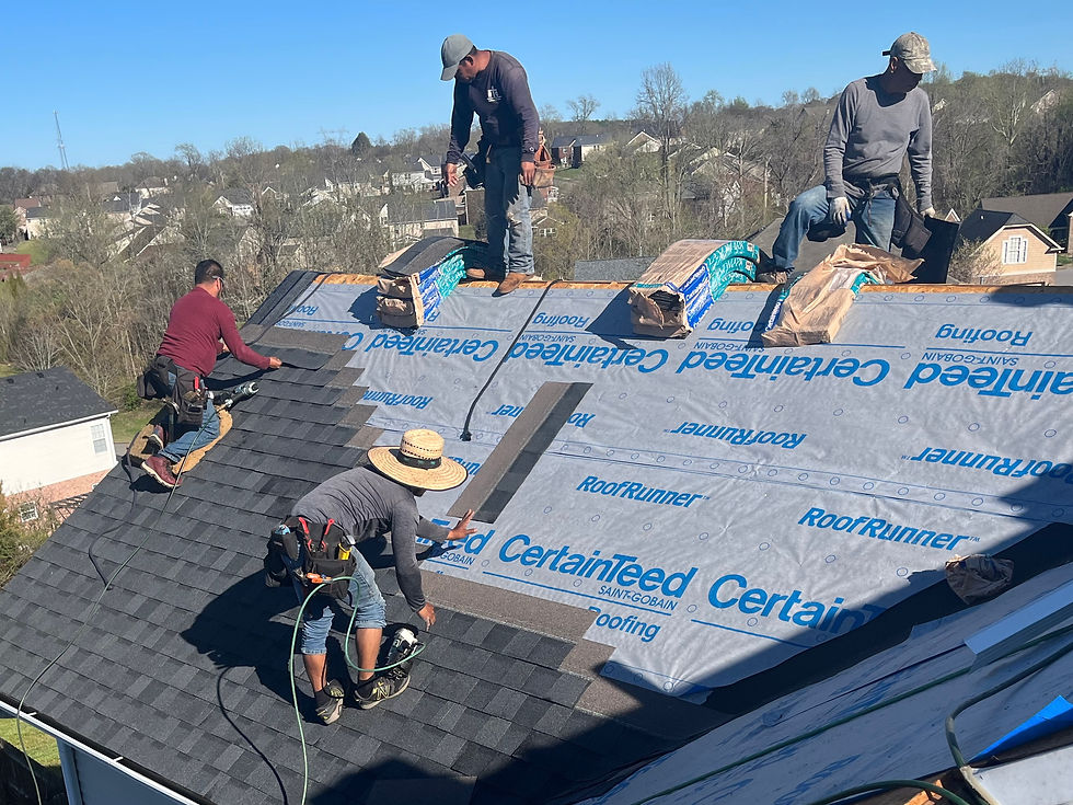 Professional roofing crew working on roof replacement