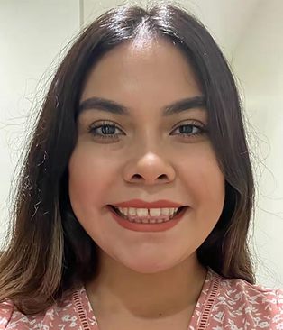 Portrait of Tania Calderon, Case Manager at Giving Tree Surrogacy, smiling with empathy