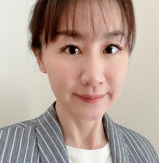 Portrait of Sarah Li, Case Manager at Giving Tree Surrogacy, smiling warmly