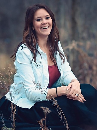 Portrait of Megan Cox, Match Specialist at Giving Tree Surrogacy, smiling warmly