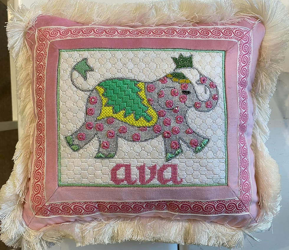 Jilly Walsh ellie (pillow made from door hanger)
