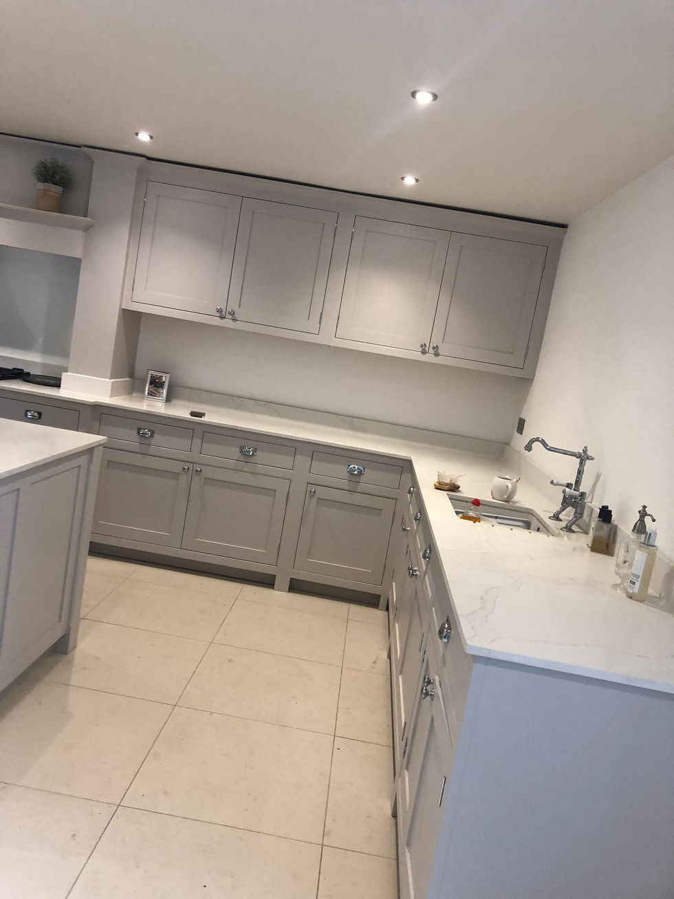 handmade kitchen, painted grey, white worktops, gold taps