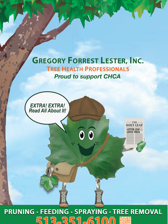 Lester Leaf mascot dresses as newspaper bot with newspaper that says extra extra lester leaf loves trees
