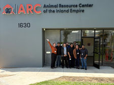 Group of ARC staff standing outside the ARC of the Inland Empire building entrance_