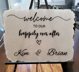 White acrylic wedding welcome sign