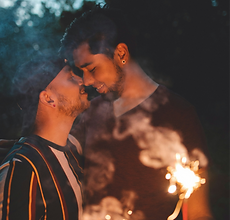 a gay couple smiling