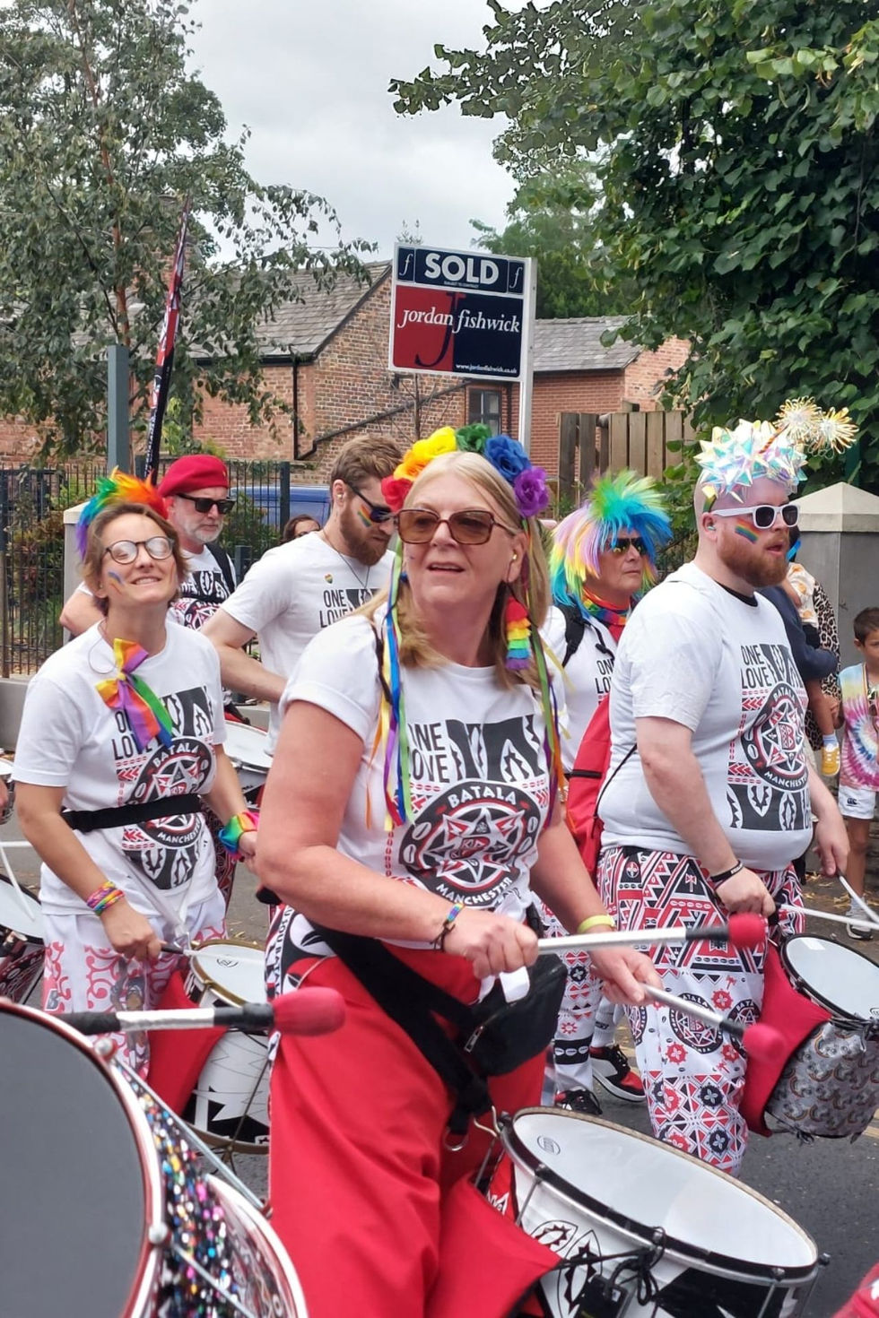 Batala players parading for Didsbury Pride