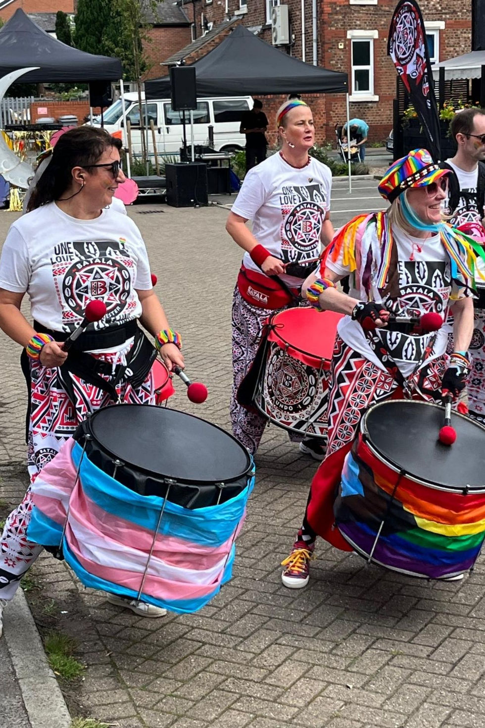 Batala Manchester players banging their drums