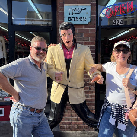 Cam and Heather with a statue of Elvis