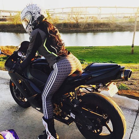 Woman sitting on a street bike