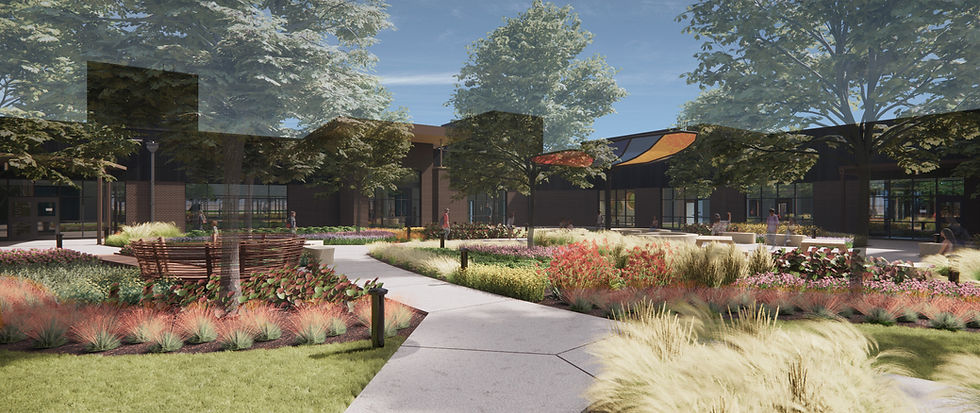Professional photo of interior staircase in a school with young girls walking up and down it, as well as reading and hanging out underneath in open spaces beneath the stairs