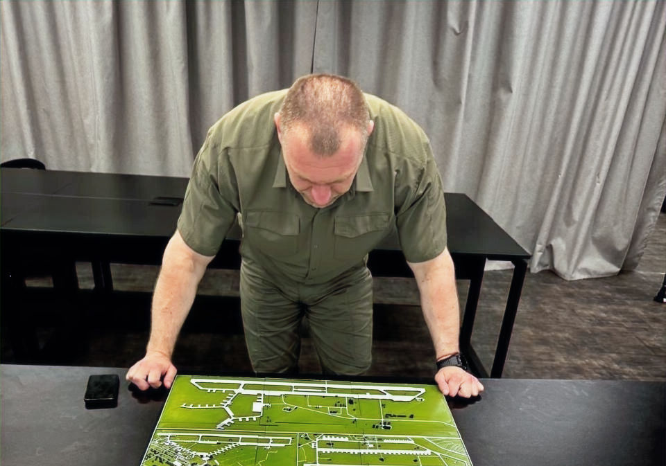 SBU chief Lt. Gen. Vasyl Maliuk standing beside a schematic map of the operation. Photo: @SBUkr