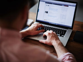 Business owner comparing digital marketing agency options in Placer County on a laptop