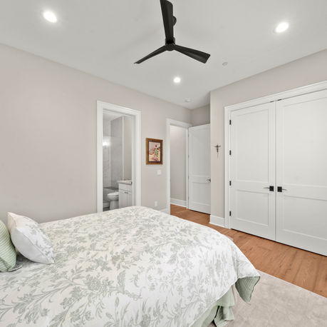 Second guest bedroom with a vaulted ceiling and double doors at The Ridge