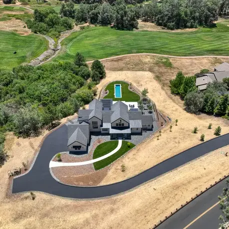 Aerial view of the Fairway View home on a golf course lot in Winchester Country Club, Meadow Vista