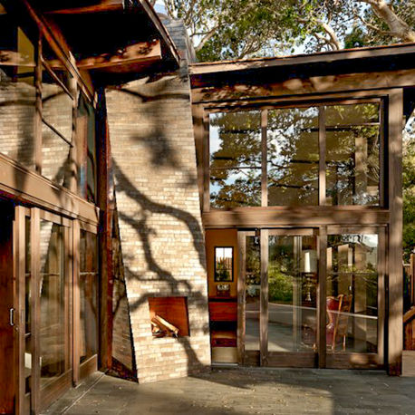 Angled timber window wall and entry glazing at Canopy House, Carmel-by-the-Sea