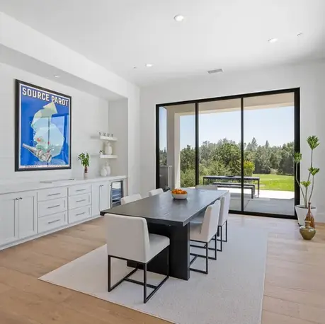 Dining room with a beverage bar and sliding doors to the patio in Meadow Vista, CA