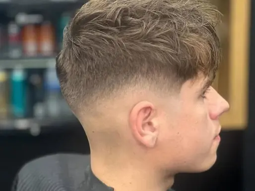 Men's textured crop with low fade at Barbery Coast Barber Shop in North Beach San Francisco