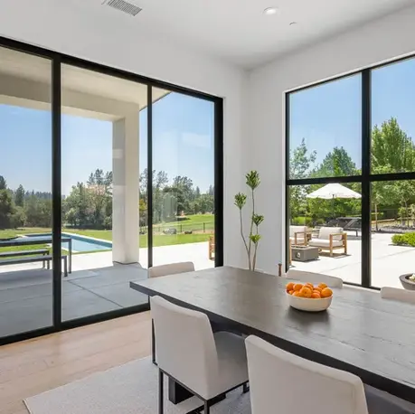Corner glazing looking out to the pool and lawn in Meadow Vista, CA