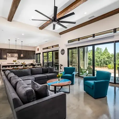 Great room opening to the patio through sliding glass doors in Somerset, CA
