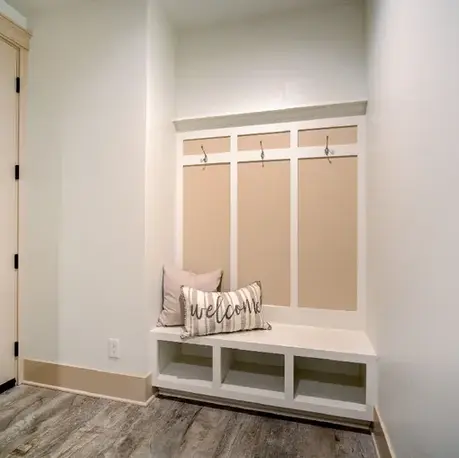 Mudroom bench with hooks and cubbies in The Motherlode