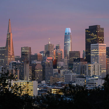 San Francisco skyline at dusk with the Transamerica Pyramid and Salesforce Tower