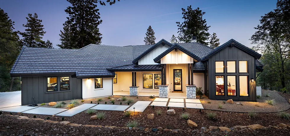 Modern farmhouse custom home with a stone entry in Winchester Country Club, Meadow Vista